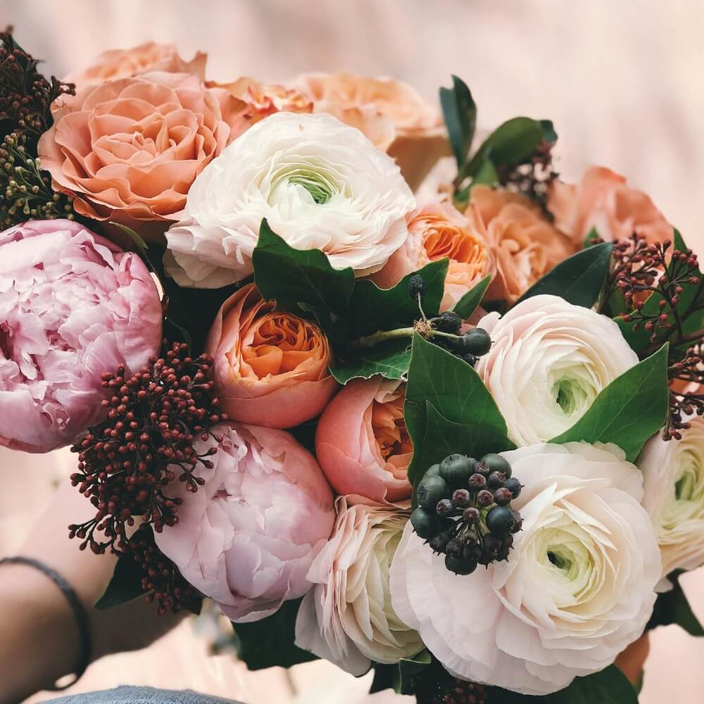 close-up of wedding bouquet with various roses