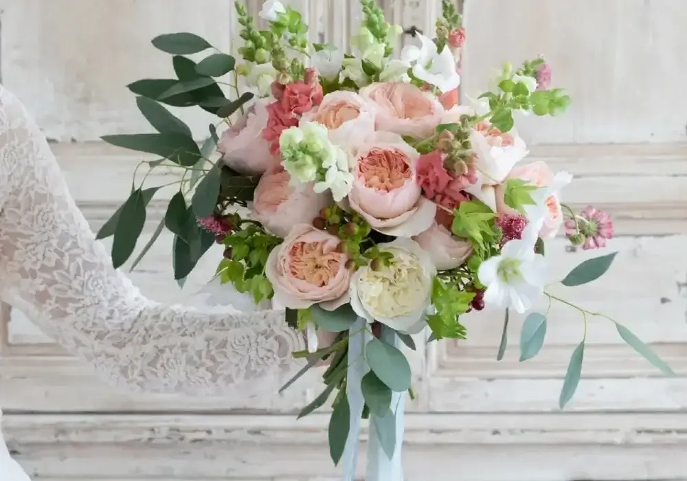 bulk wedding roses bridal bouquet with David Austin and garden roses in blush and cream tones with greenery
