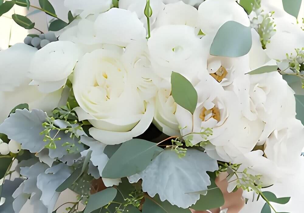 white elegant ranunculus wedding bouquet