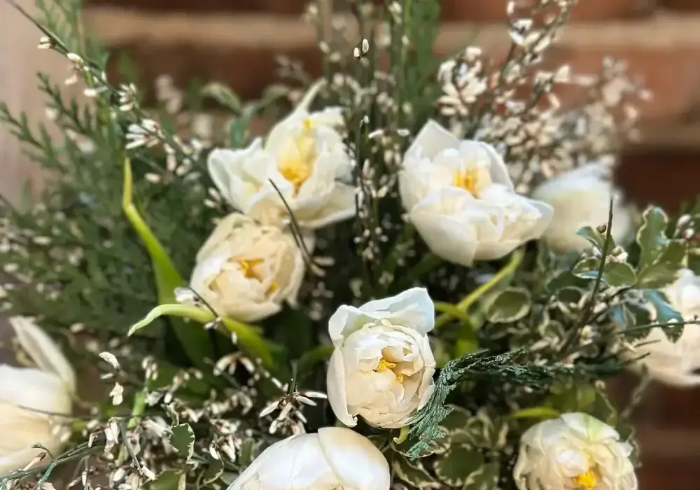 Assorted fresh-cut flowers arranged for DIY floral centerpiece