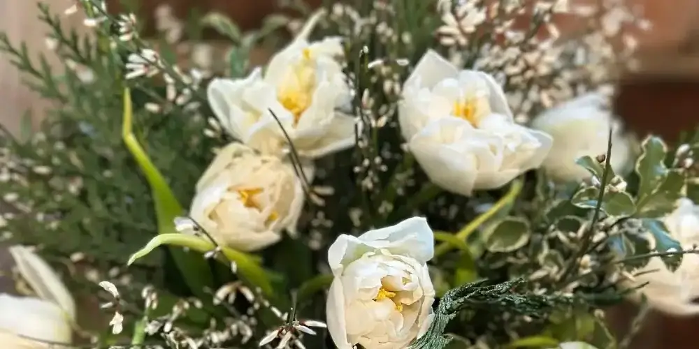 Assorted fresh-cut flowers arranged for DIY floral centerpiece